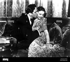 MERRILY WE GO TO HELL, Fredric March, Sylvia Sidney, 1932 Stock Photo -  Alamy