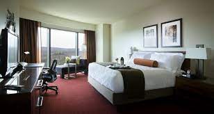 Mgm Grand At Foxwoods Producer Suite These Spacious Suites Feature Panoramic Window Walls While Boasting A Bedroom Complete With Top Beds Luxury Pillows Bed