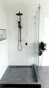 Black And White Marble Tile Shower White Marble Subway Tiles Matte Black Our Ensuite Renovations White Marble Bathrooms Bathroom Decor Luxury Marble Tile Bathroom