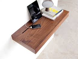 A 12.25 round shelf holds the wireless charging pad and can also be used for extra storage needs. This Elegant Shelf Hides Your Mess Of Charging Cables Wired