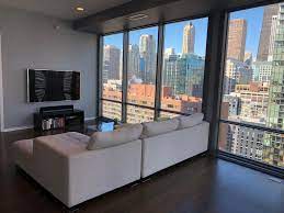 Modern Chicago Condo For Rent With World Class Views High Rise Apartment Decor Apartment View Chicago Condos