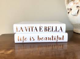 Others are humorous or inspirational. Life Is Beautiful Decorative Books Decorative Book Set Gold Etsy Book Decor Beautiful Bookshelf Book Set