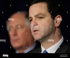 Former Assistant U.S. Attorney Patrick Collins, right, speaks at a news  conference Friday, Jan. 16, 2009, in Chicago after he was picked by  Illinois Lt. Gov. Pat Quinn to head the Illinois