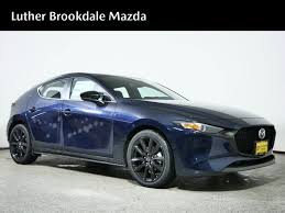 Image result for Electric Blue 2007 Mazda3