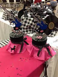 Use disco party supplies at the 70's themed party! 50 S Sock Hop Centerpieces Sock Hop Party Diner Party 50th Party