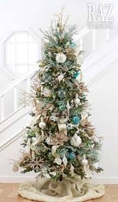 The golden mud, sunset yellow, pale red, misty gray, pearly green and various washes for green. 25 Beach Christmas Tree Ideas Beachfront Decor Coastal Christmas Decor Unique Christmas Trees Slim Christmas Tree