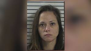 Iredell County woman arrested after police found pills, brass knuckles