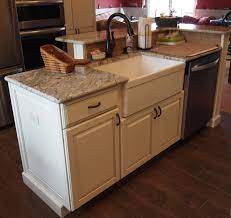 Farmhouse kitchen island with sink and seating. Kitchen Island With Farm Sink And Dishwasher And Elevated Breakfast Bar Kitchen Island With Sink And Dishwasher Kitchen Island With Sink Kitchen Sink Design