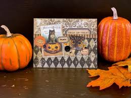 If you're looking for a few halloween cards to make with toddlers or younger children, here are a few easy halloween cards to make that kids might enjoy. Make A Quick Collage Halloween Card With Tim Holtz Nally Studios