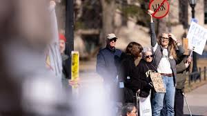 Iowa City protestors call for 'peace' and an end to the war in Iran