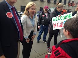 Heidi cruz adjusts the collar of her husband republican presidential candidate sen. Heidi Cruz Is On A Mission To Make Ted More Well Liked