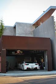 Looks Like My Garage Oh Except For The Beautiful Auto Garage Style Modern Garage Dream Car Garage