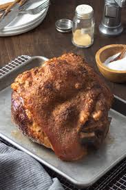 Set the meat on a rack set into a roasting pan. Roasted Pork Shoulder Cook The Story