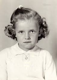 Remember hair barrettes (called slides in the uk). Here I am in 1957 in a  Fishers School photo (second grade). I have at least two barrettes in my  hairdo.