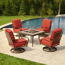 Hampton Bay Oak Cliff 5 Piece Metal Patio Fire Pit Conversation Set With Chili Cushions 176 411 5fp V2 The Home Depot Outdoor Patio Furniture Sets Patio Furniture Fire Patio Furniture Conversation Sets