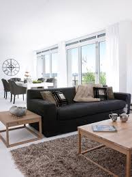 Like How The Dark Sofa Looks In The Light Room Love The Giant Clock Too Sofa Decor Black Sofa Living Room Black Couch Living Room