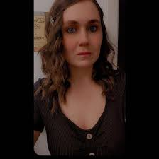 What type of bird is almost black with white markings