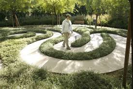 Lorena Mojica Of One Thousand Palms An Intern Tour Guide Walks Through The Labyrinth At The Sunnylands Ce Labyrinth Garden Spiritual Garden Sensory Garden