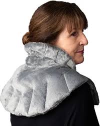Sharper image heated neck & shoulder wrap new in box never been used.  Freeze for cold or use microwave to heat it up.