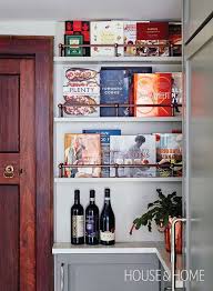 20 Stunning Ways To Store Books In Your Kitchen Including This Gorgeous Custom Bookshelf Kitchen Bookshelf Home Decor Cookbook Shelf