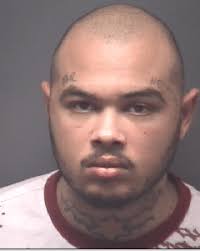 Greenville man wanted in series of car break-ins, gun thefts