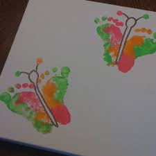 My Daughter Made This Canvas For Her Baby S Nursery First She Painted The Bottom Of Maycee S Feet With Paints In Colors To Matc Crafts Art For Kids Diy Canvas