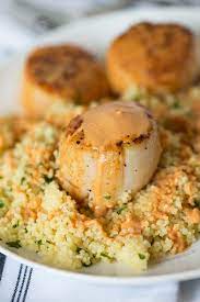 Scallops With Spicy Curry Sauce And Couscous Recipe Scallop Recipes Recipes Seafood Recipes