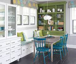 The breakfast nook in this 1930s colonial is cleverly outfitted in a large bay window for beautiful morning light. Breakfast Nook Cabinets Decora Cabinetry