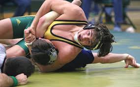 WRESTLING: McCormack wins regional title, leads handful for Beaver  Dam/Wayland headed to sectionals