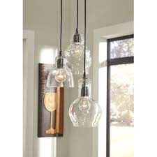 It blends industrial and farmhouse style making it a versatile fixture as accent lighting over a kitchen island or as a dining light over a smaller table. Pin By Emma Lina On Smart Home In 2021 Glass Pendant Light Clear Glass Pendant Light Farmhouse Pendant Lighting