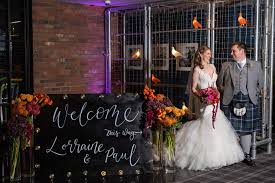 Watercolor floral dresses are getting a lot of attention right now. Bold Colourful Flowers For A Modern Edinburgh Wedding