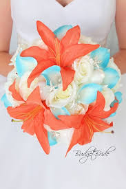 When it comes to flower arrangements and centerpiece ideas, wedding themes can come in great pairs, such as coral and peach wedding flowers, coral and white flowers, aqua and coral wedding flowers, coral and mint wedding flowers, coral and teal flowers, coral and turquoise wedding flowers, coral and blue flowers, and more. Coral Reef Davids Bridal Wedding Flowers