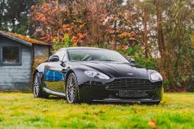Image result for Jet Black 2010 Aston Martin