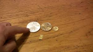 The 1 oz canadian maple leaf gold coin is one of the world's most popular gold bullion coins. Bullion Bug 1 Oz Gold Eagle Versus 1 Oz Silver Eagle With 1 10 Oz And 1 Gm Engelhard Bar Youtube