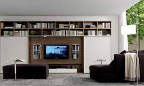 The collection include many items like different shelf elements, hanging drawer containers with invisible runners, bookcase and other storage containers that could accommodate not only books but also different decorative elements. 15 Modern Tv Wall Units For Your Living Room