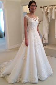 Simple elegance with a vintage twist, this wedding dress is a trendy tea length and is inspired by the iconic audrey hepburn. Cheap Lace Wedding Dresses Lace Bridal Dresses Dorris Wedding