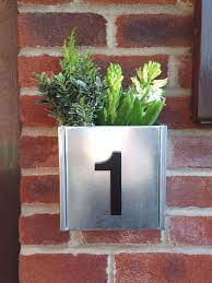 House number 21117 might be 21.117 miles down the road from that survey marker, if it was a long country road. House Number Planter One Digit