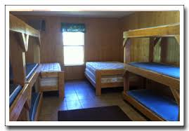 Bluebell cabin is a beautiful secluded cabin and is equipped with 4 bedrooms (2 double and 2 twin) and a double sofa bed in the open plan hot tub with river view. Diamondhead Resort Illinois River Oklahoma Bunkhouses