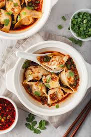 Adjust the heat so the broth simmers and cooks to lightly flavor. Sichuan Chili Oil Wontons Recipe Takes Two Eggs