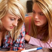 Closeup of teenager playing videogames on mobile phone. 11 Facts About Teen Pregnancy Dosomething Org