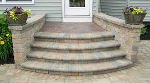 This Homeowner Did Away With The Concrete Stoop And Stairs And Asked Us To Build A Nice Stone Patio So They Could Sit Out Patio Stairs Patio Steps Patio Stones