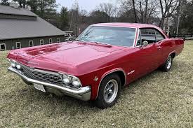 Image result for Regal Red 1965 Chevrolet