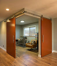 On one side, toiletries are tucked. Remodelwest Image 12 Office Barn Doors Open Lighter Remodelwest