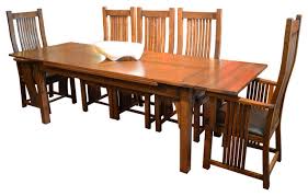 arts and crafts oak dining table with 2
