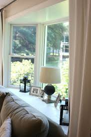 There are different ways to use this space. 30 Bay Window Decorating Ideas That Blend The Functionality And Gorgeous Decor Into Co Bay Window Living Room Window Treatments Living Room Living Room Windows