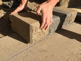 A keystone block retaining wall can be a great landscaping feature in your place. How To Install Steps With Retaining Wall Blocks Hilgersom Inc