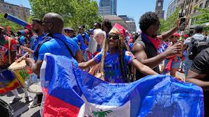 Haiti fans march from Copley Square ahead of World Cup soccer match between Haiti and Scotland