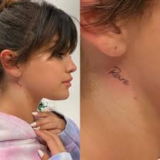 Gallery of selena gomez's tattoos that can be filtered by subject, body part and size. 236 Likes 2 Comments Et Canada Etcanada On Instagram Selena Gomez Gets Inked With A New Neck Tat Small Neck Tattoos Behind Ear Tattoo Small Neck Tattoo