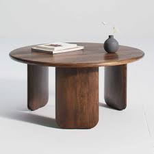 This round coffee table is just the right piece to make a statement in your living space. Anton Solid Wood Coffee Table Round