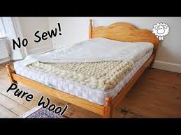 You Ll Learn How To Make This Toasty Warm Mattress Topper And Where To Buy The Wool Cheap This Is A No Sew Project Hoora Diy Mattress Mattress Wool Mattress